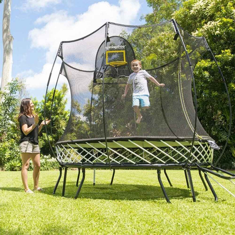 Children playing on Springfree 8ft Trampoline