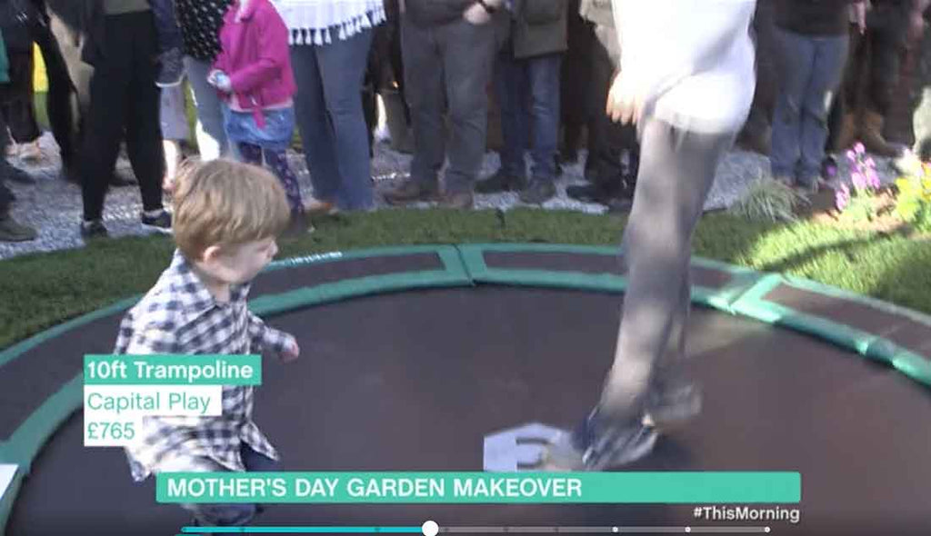 kids playing on capital play trampoline