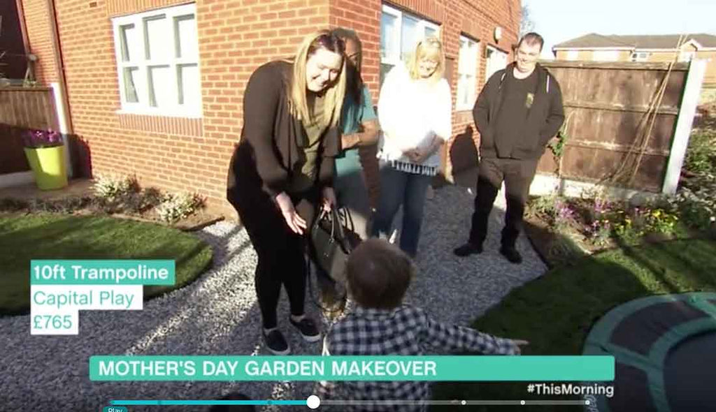 Family on in-ground trampoline