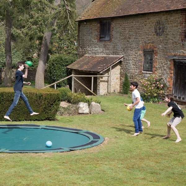 dodgeballs on in-ground trampoline