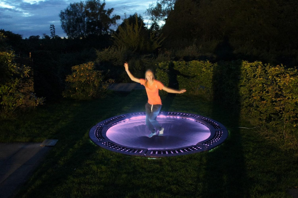 Purple trampoline lighting