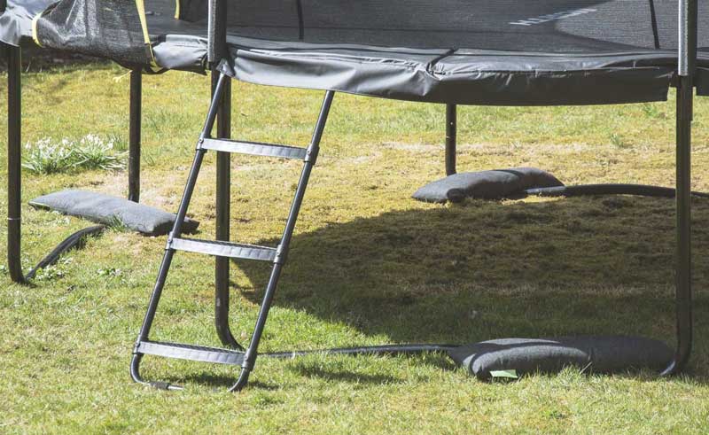 Sand bags to secure trampoline