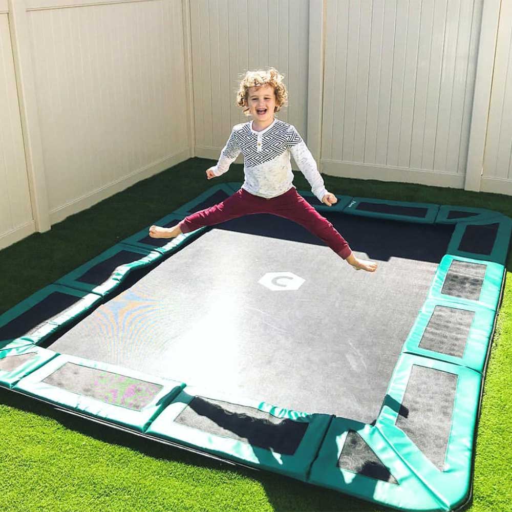 boy on trampoline in USA